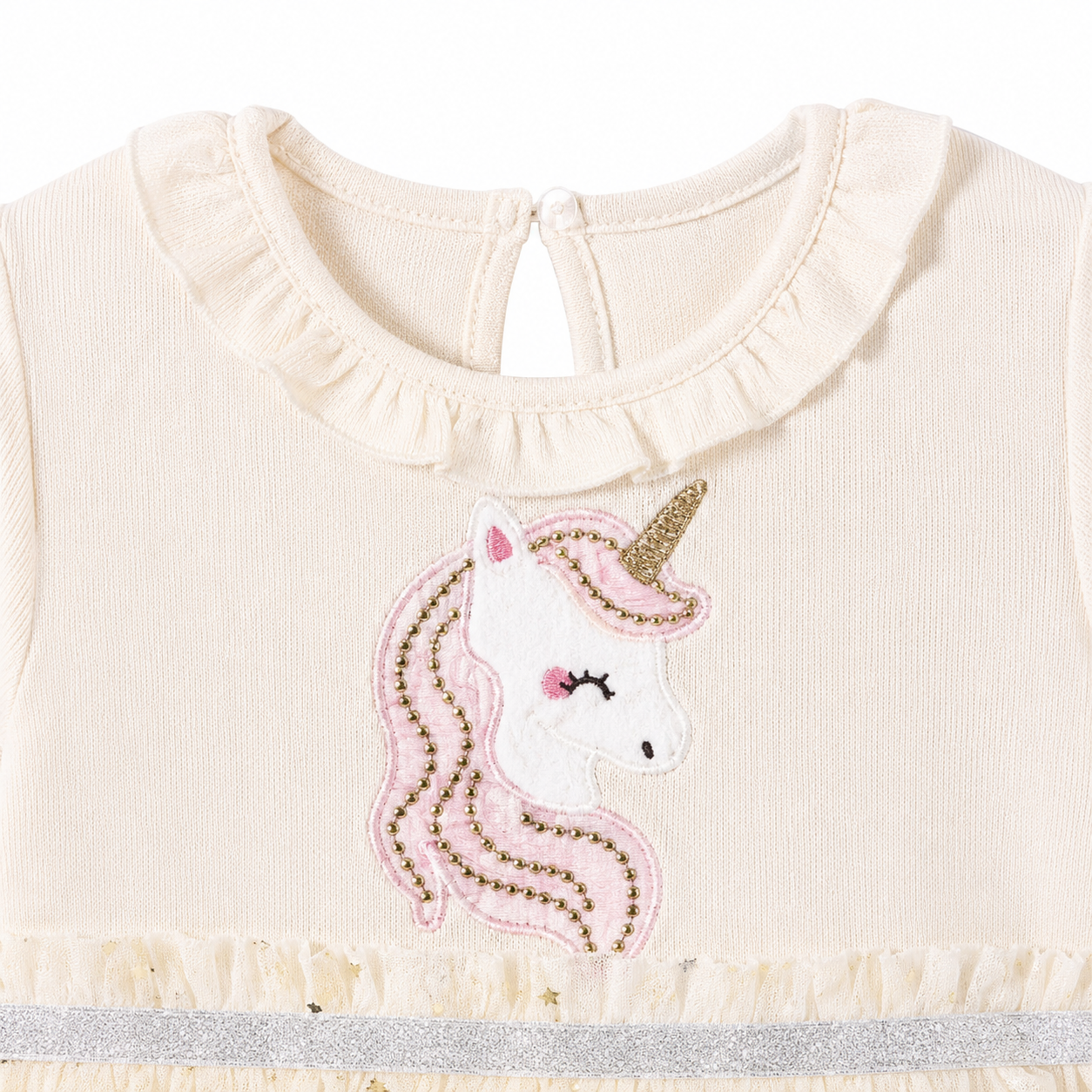 Close-up of the unicorn applique detail on the bodice.