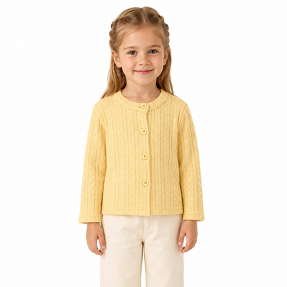 Girl model wearing the Butter Yellow cotton cable-knit cardigan.