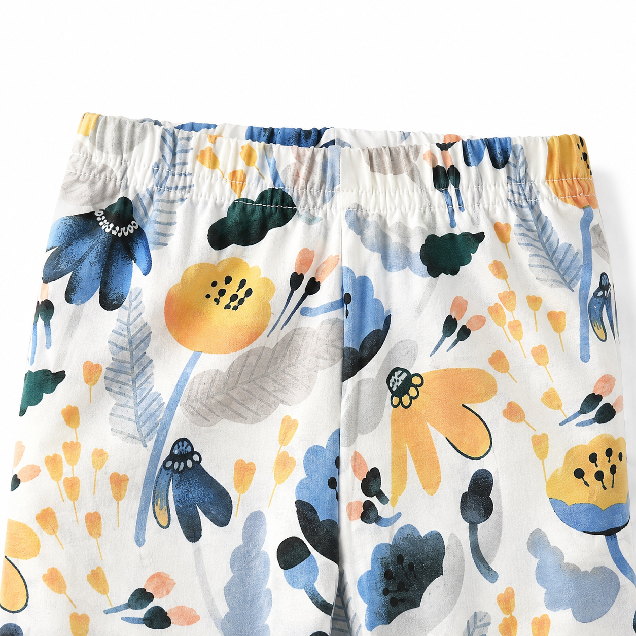 Close-up of the elastic waistband and botanical floral print.