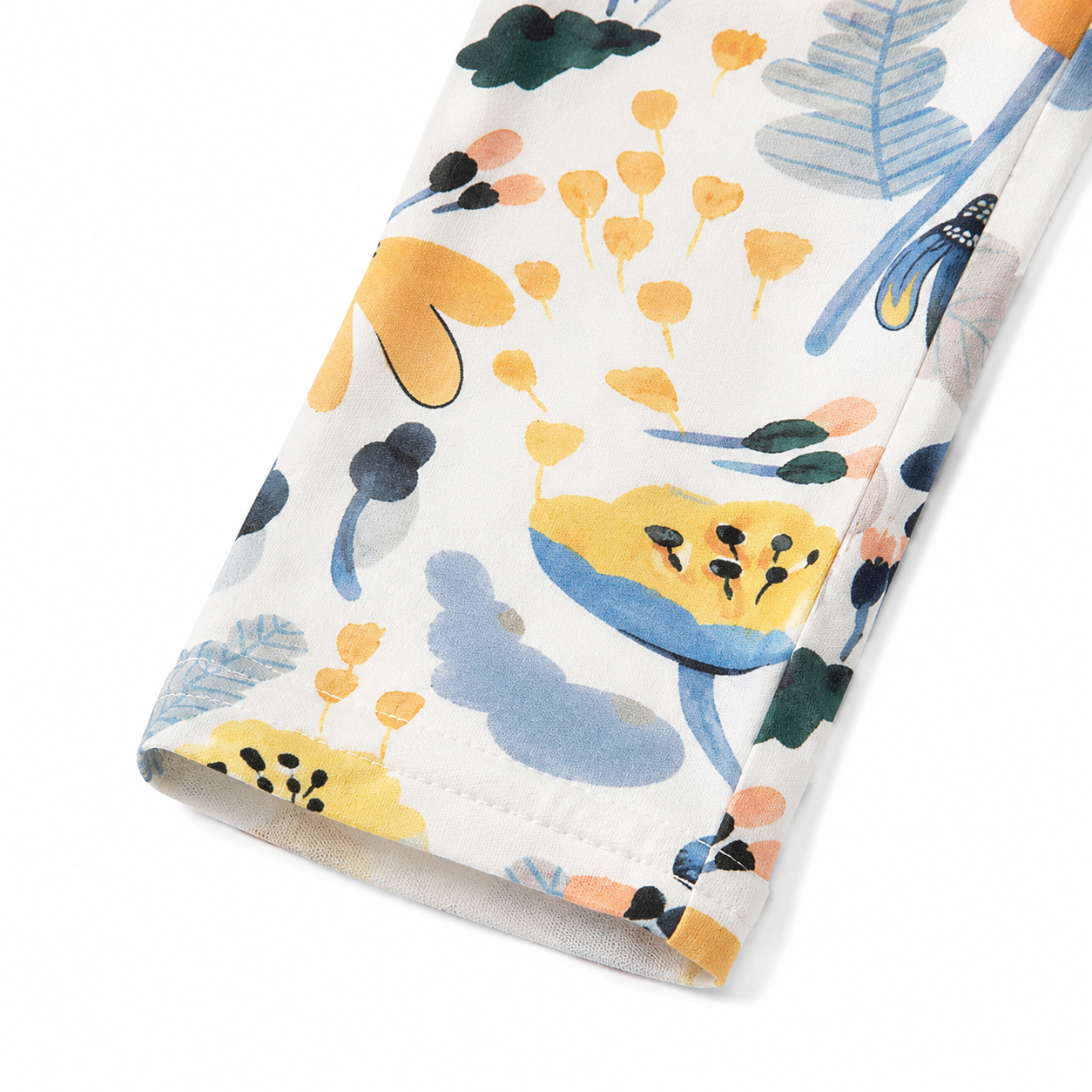 Close-up of the straight-leg hem and floral print detail.