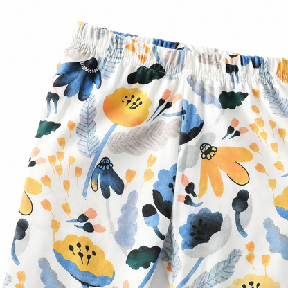 Close-up of the waistband and blue yellow botanical pattern.