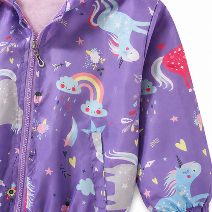 Close-up of the unicorn and rainbow print on the purple unicorn waterproof jacket.