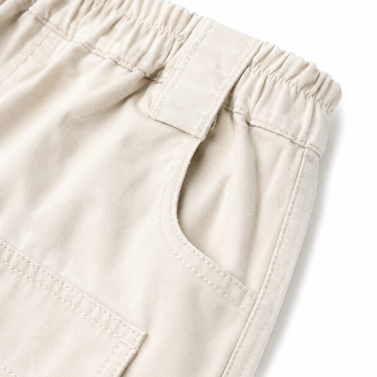 White cotton cargo shorts side pocket and elastic waistband detail