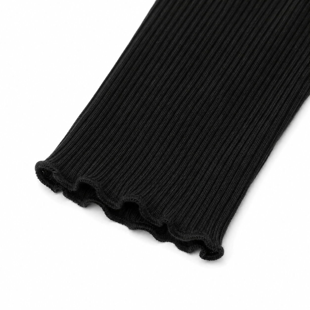 Close-up of the black long sleeve cuff with lettuce-edge finish.
