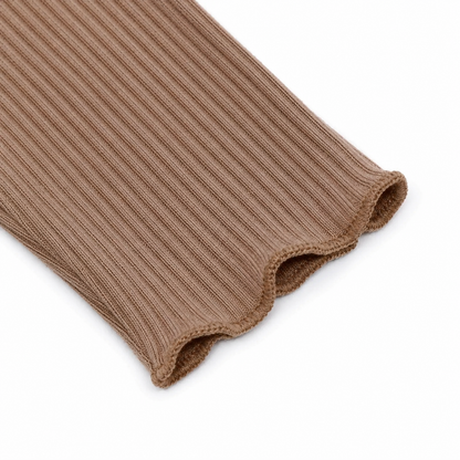 Close-up of the mocha long sleeve cuff with lettuce-edge finish.