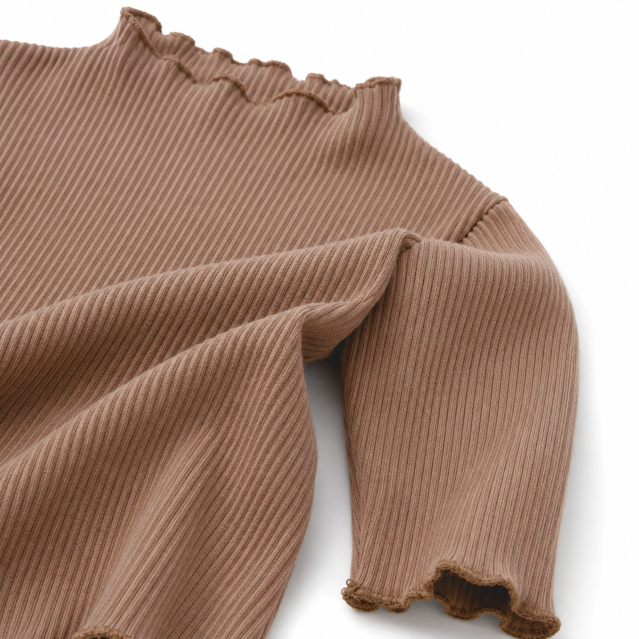 Close-up of the mocha ribbed fabric texture and finished edge.
