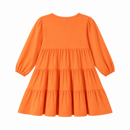 Back flat lay of the orange girls long sleeve tiered dress.