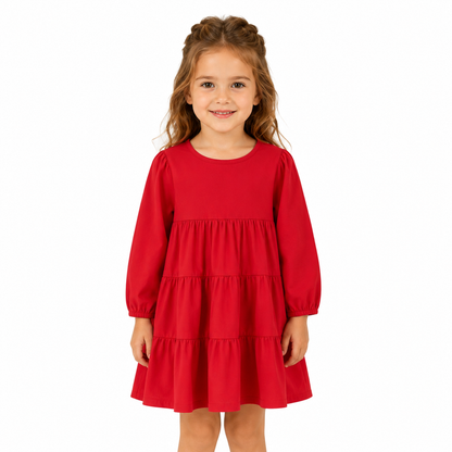 Girl model wearing the red cotton tiered dress for everyday wear.
