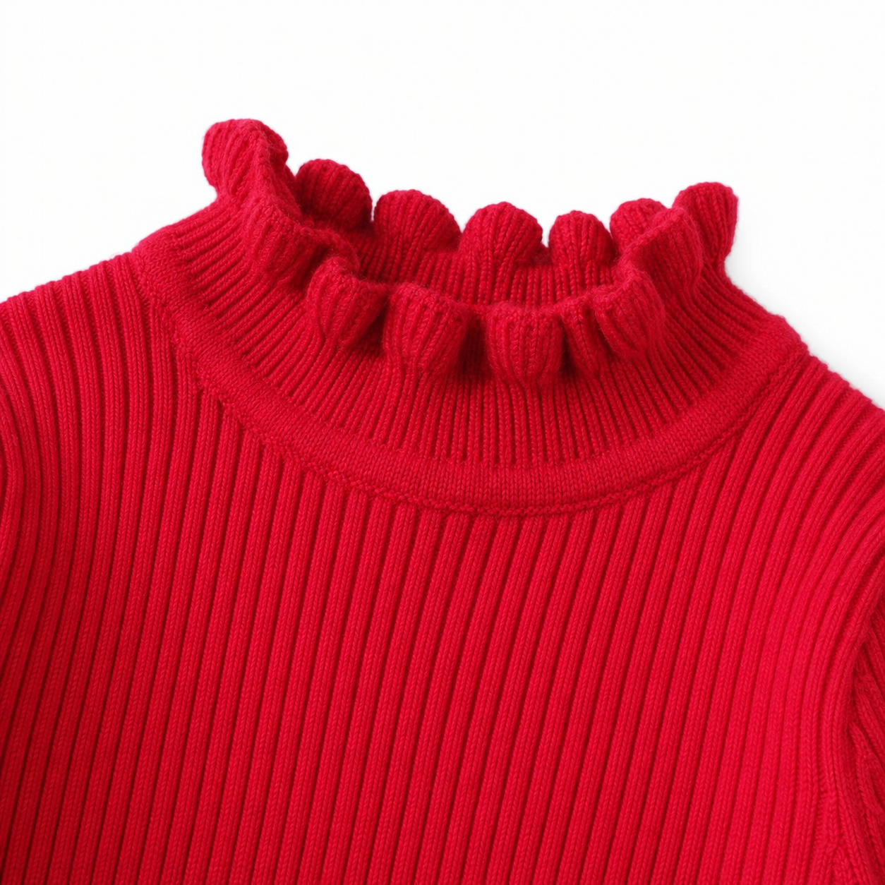 Close-up of the ruffle mock neck detail on the red girls long sleeve top.