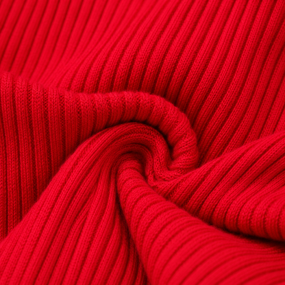 Close-up of the ribbed fabric texture on the red long sleeve girls top.